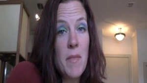 Mature redhead licks and jerks a cock until it explodes