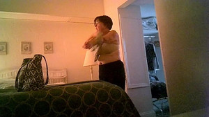 Naughty old woman showing her sexy body at home