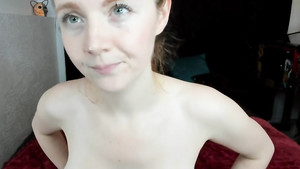 Young redhead mommy is using a vibrator to cum in her show