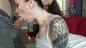 Tattooed whore deepthroats and gets nailed by a huge cock