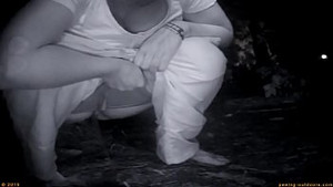 Amateur girls are pissing during a rock festival