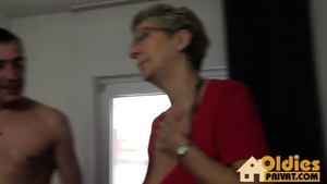 Two mature ladies are giving blowjob to the man