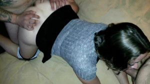 Slutty wife on her knees getting sandwiched by two horny men