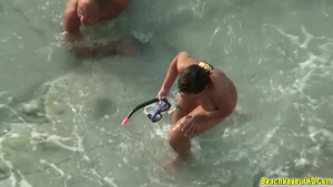 Captivating milf gets fucked from behind on the hot beach