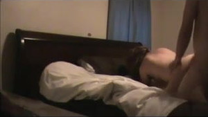 Amateur MILF filmed fucking her husbands boss in motel room