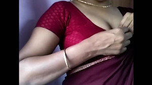 Nasty amateur Indian MILF teases with her big hooters POV