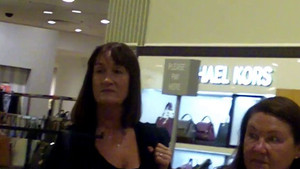 Hot milf gets followed around a store with her feet being filmed the whole time