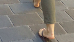 Mature woman gets her videotaped as she's walking down the street unsuspectingly