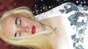 Blonde wears pantyhose while pleasuring her tight wet pussy in a closeup