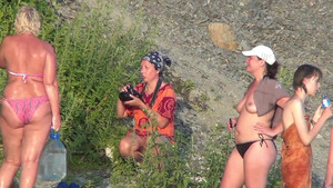 Seductive beauties get exposed in the public bathroom by a hidden cam